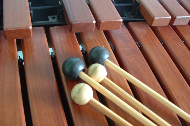 Xylophone with percussion sticks.