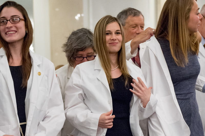 Drexel students in the College of Medicine receive their first white coats as part of an annual ceremony.