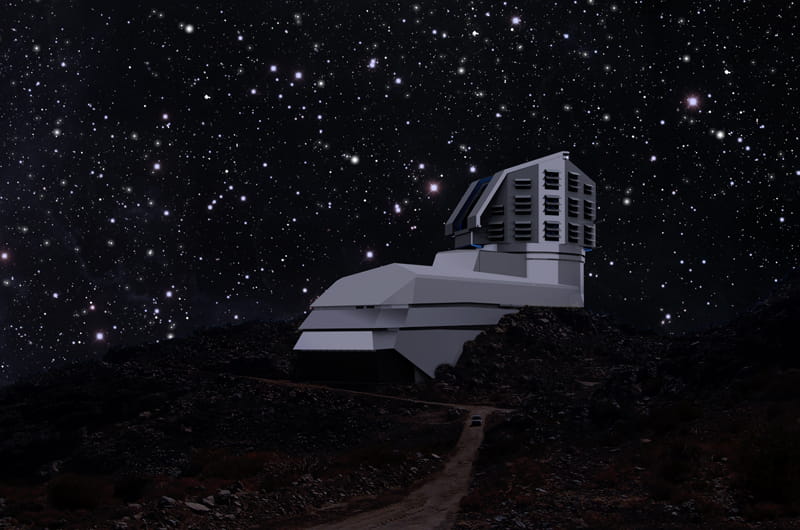 A mixture of photo and rendering showing the LSST facility building sitting on the Cerro Penchón ridge in Chile. Courtesy of the LSST Corporation.