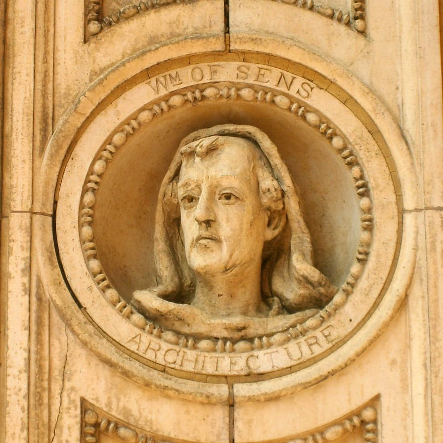Bust of William of Sens, representing architecture, on the archway of Main Building.
