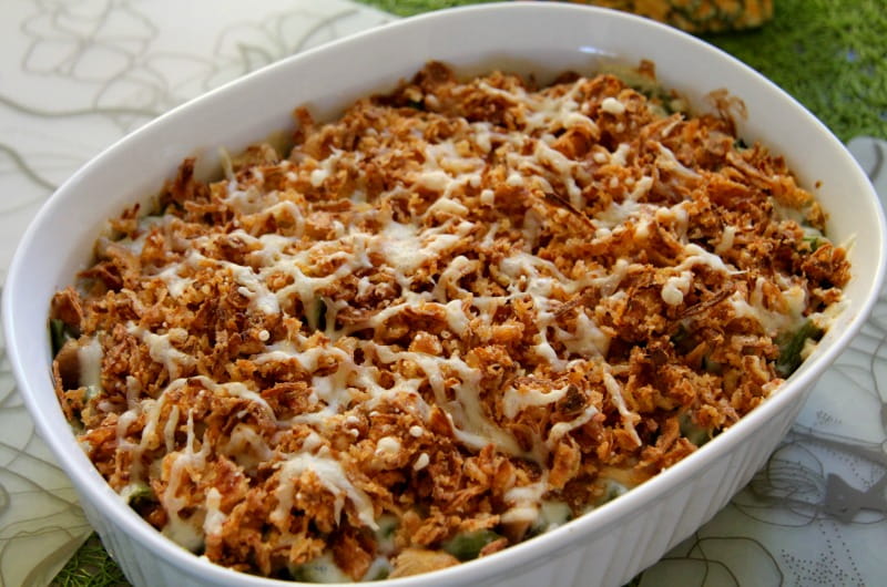 A green bean casserole made with fried onions and sprinkled cheese. Photo courtesy Flickr user Phil King.