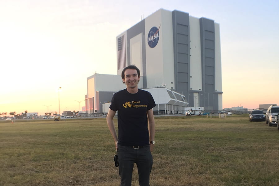 After helping to develop the ground support equipment, Matthew Wiese (mechanical engineering) observes the launch of the GOES-R next-generation weather satellite at the Kennedy Space Center in Cape Canaveral, Florida. 