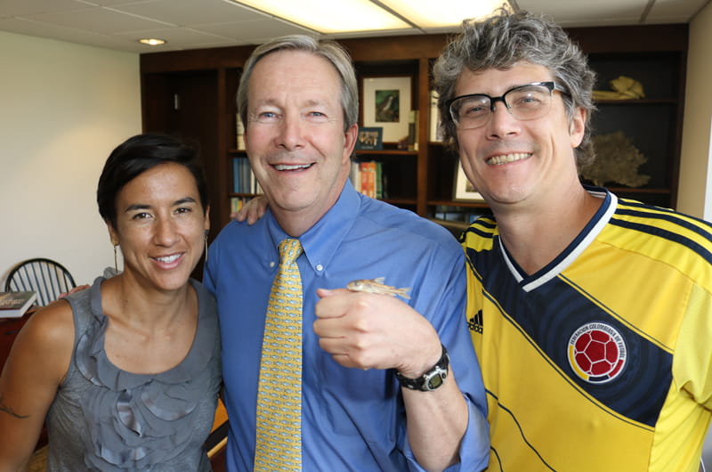 Gephart holding the fish named for him with the researchers who named it for him, Mark Sabaj (left) and Mariangeles Arce H. (right).