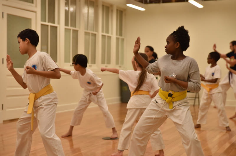 kids from the West Philadelphia area taking a karate class at the Dornsife Center