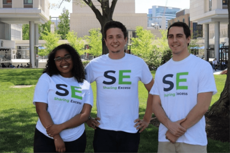 Evan Ehlers, center, a senior the Close School of Entrepreneurship, stands with members of his Sharing Excess startup.
