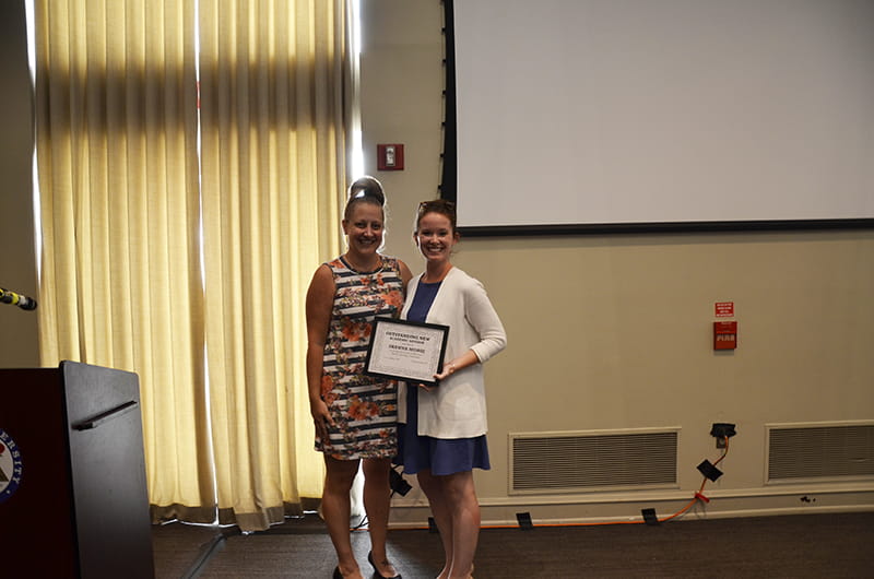 Janet Golon, left, and Shawna Morse. Golon presented Morse with the Outstanding New Advisor Award.