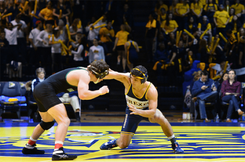 A scene from one of the men's wrestling team's matches in 2018.