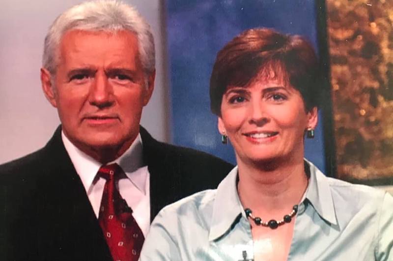 Vice President and University Secretary Janice K. (Jake) Marini pictured with Alex Trebek while appearing on "Jeopardy!"