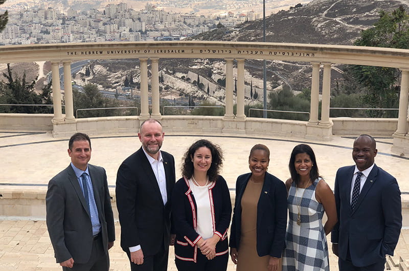 The Drexel delegation in front of the Hebrew University of Jerusalem's amphitheater. Left to right: Michael Yudell, Aleister Saunders, Sharon Walker, Koren Bedeau, Bridget Blake and M. Brian Blake. 