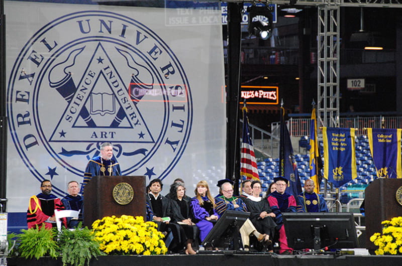 Drexel University President John Fry speaking at the 2018 University-wide commencement ceremony.