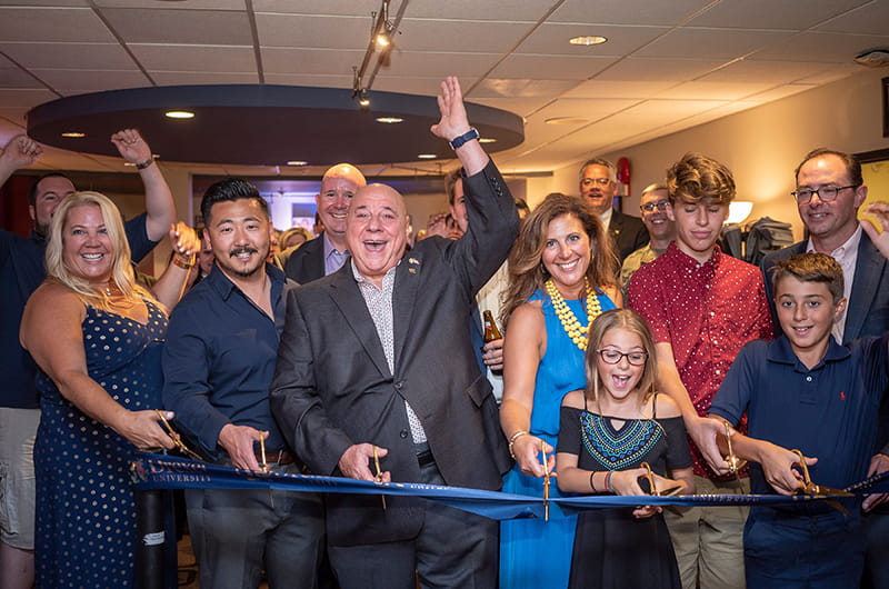 In 2019, Drexel opened the Masci Family Student Veterans Lounge, which was renovated thanks to a generous gift from U.S. Army veteran Thomas A. Masci, Jr. ’68, center. Andrew Stoffer is on his left.