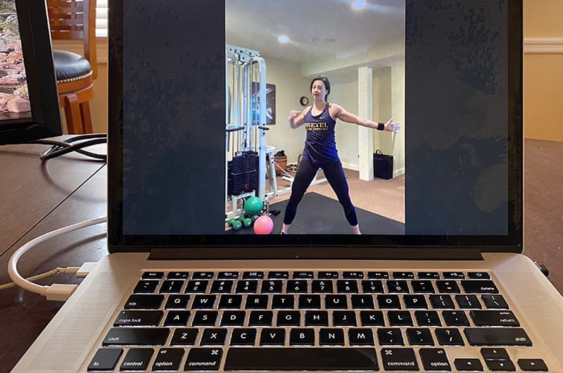 A conditioning group exercise class taught on Zoom by Drexel instructor and alumna Johanna Burns. Photo credit: Bryan Ford.