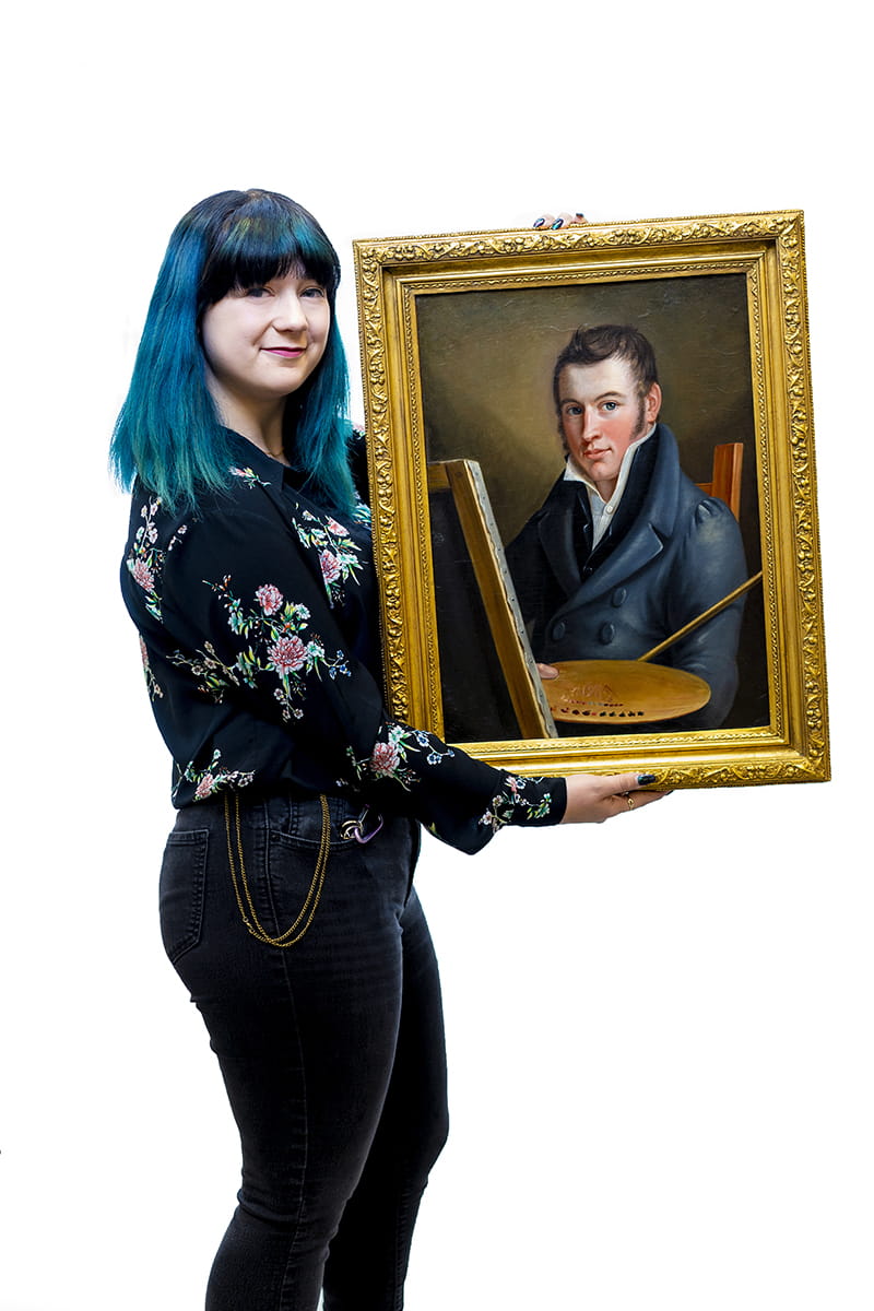 Isabella Sangaline with "Self-Portrait" by Francis Martin Drexel (oil on canvas, 1817) stored in The Drexel Collection. Photo credit: Jeff Fusco. 