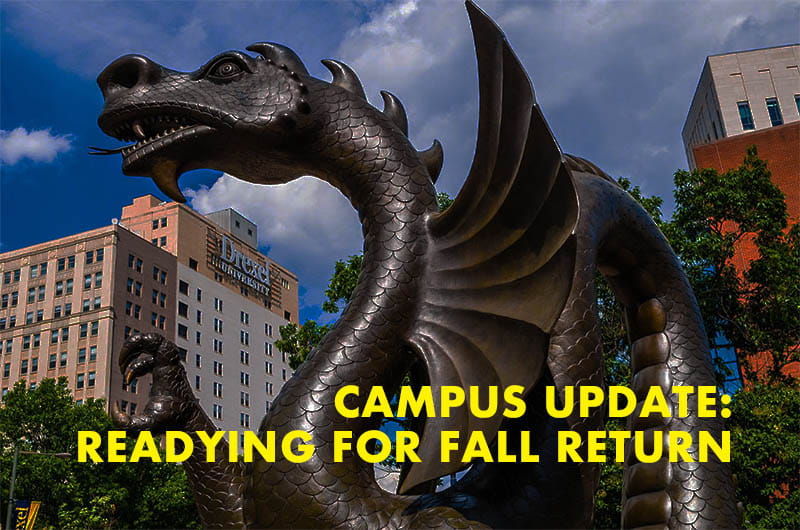 Dragon statue plus text that reads readying for a fall return 