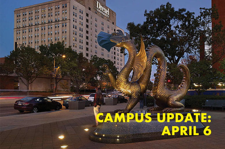 Dragon statue with the text campus update April 6