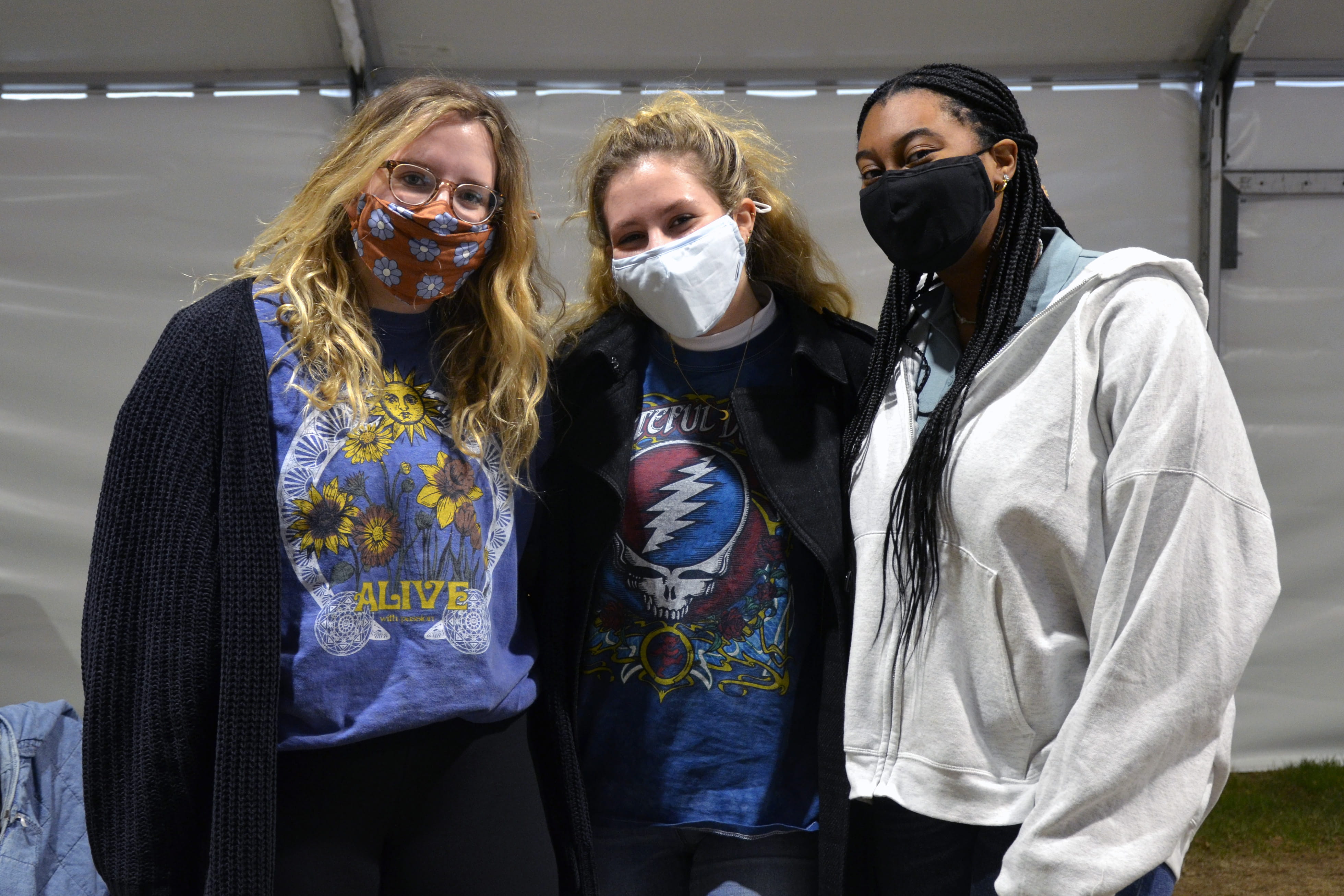 (From left to right) Meaghan Elliot, Isabella Willing and Zakiyah Harrison — all first-year graphic design students — come together for lunch in one of the tents near Race Hall set up for students to meet in a distanced, outdoor environment. 