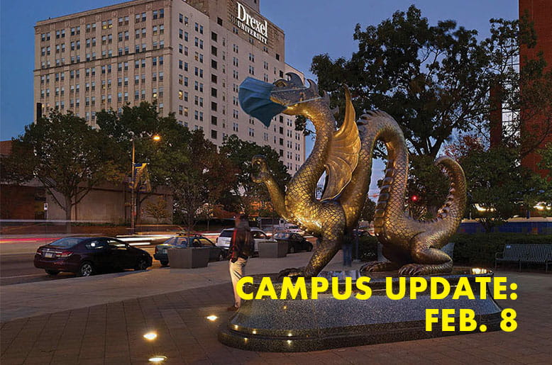 Dragon statue with the text campus updaye Feb. 8