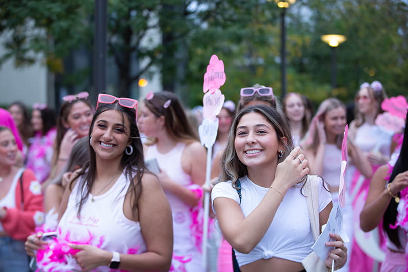 Zuleyha Kumas (right) being welcomed by her new sisters in Phi Sigma Sigma on Bid Day. Photo by Charles Shan Cerrone.