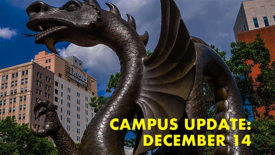 Dragon statue with the text campus update December 14