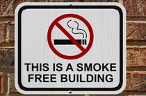 A warning sign saying "This is a smoke free building."