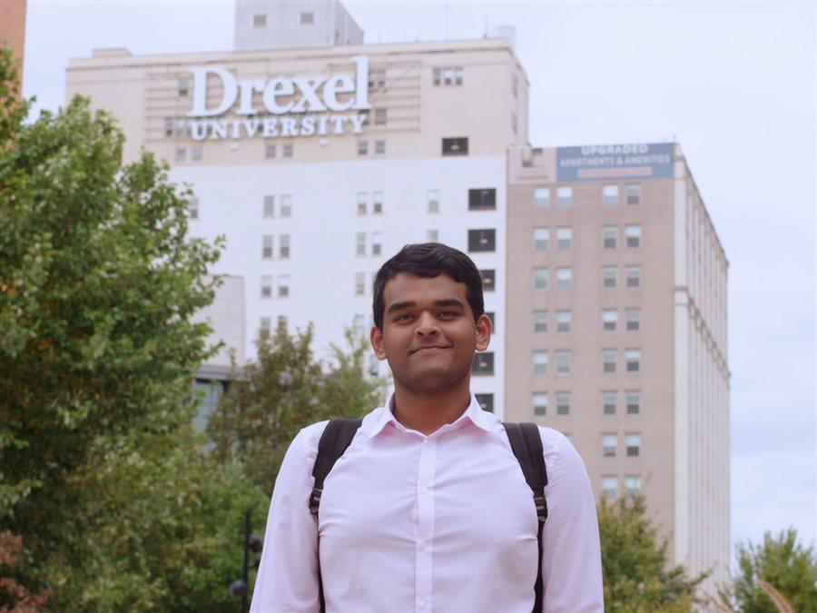 Student standing outside of Drexel campus building