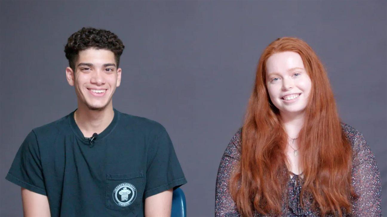 Two students smiling )