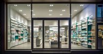 empty pharmacy lit from within