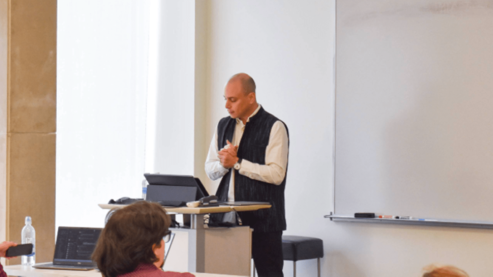 Benjamin Bradlow speaking to an audience at UHC Invited Speaker Series 