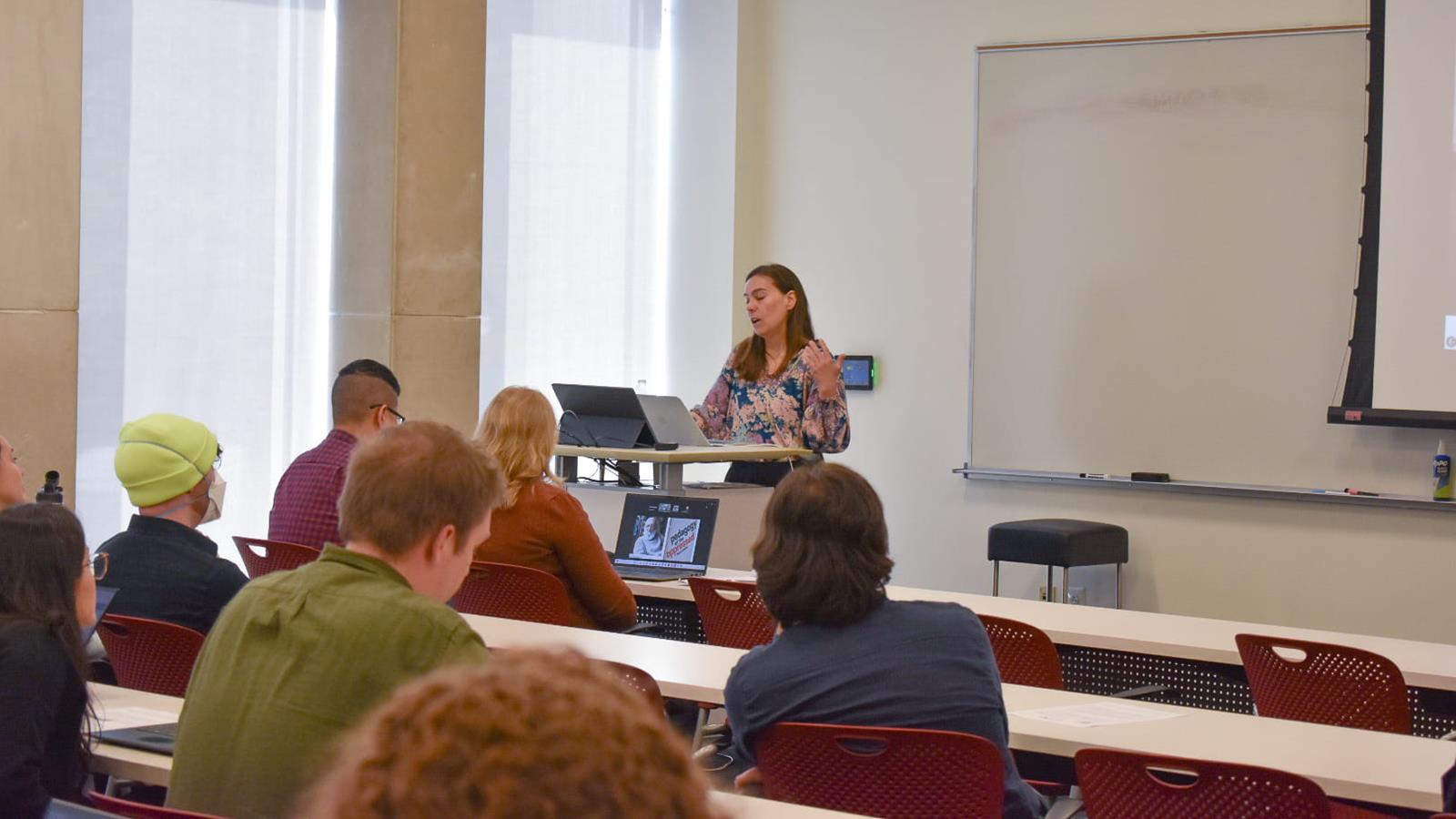 Mariana Arcaya speaking at the UHC's Invited Speaker Series