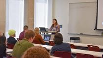 Mariana Arcaya speaking at the UHC's Invited Speaker Series