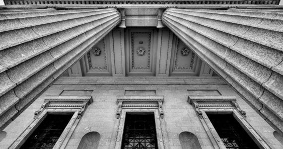 Black and white photo of government building columns