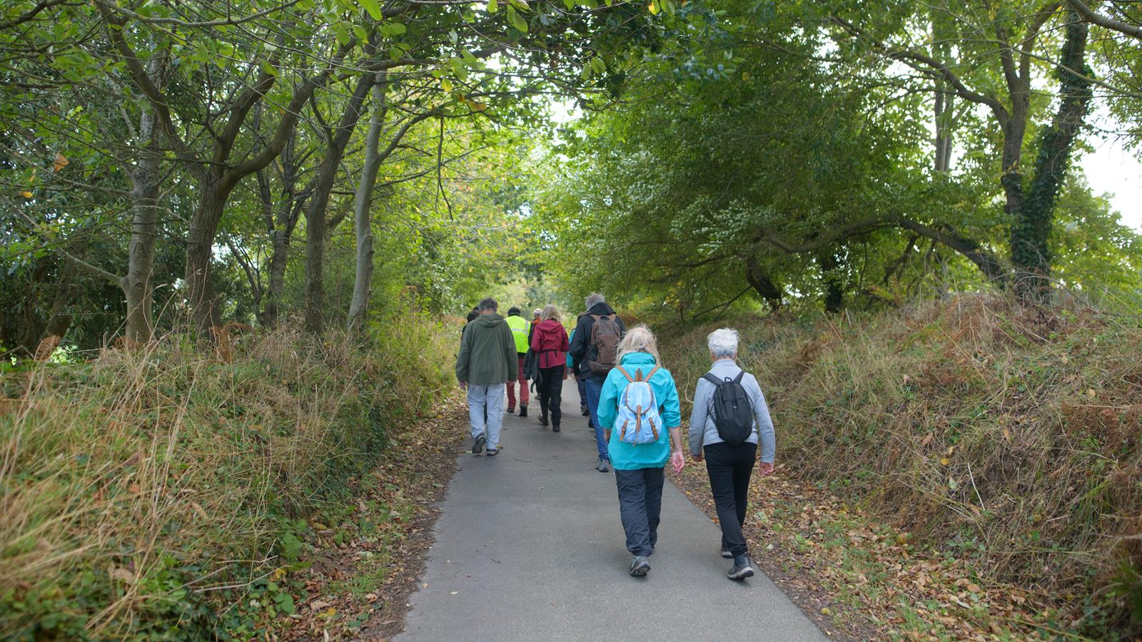 Group of seniors walking on a trail in Bretagne France