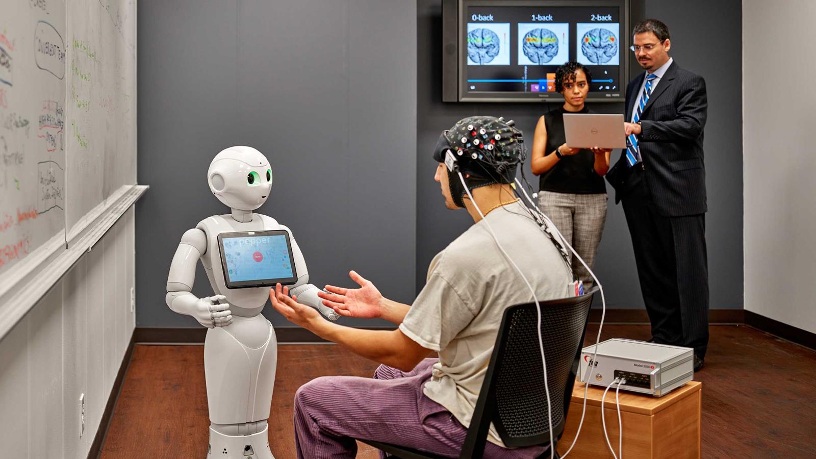 A Drexel student and Pepper the Robot