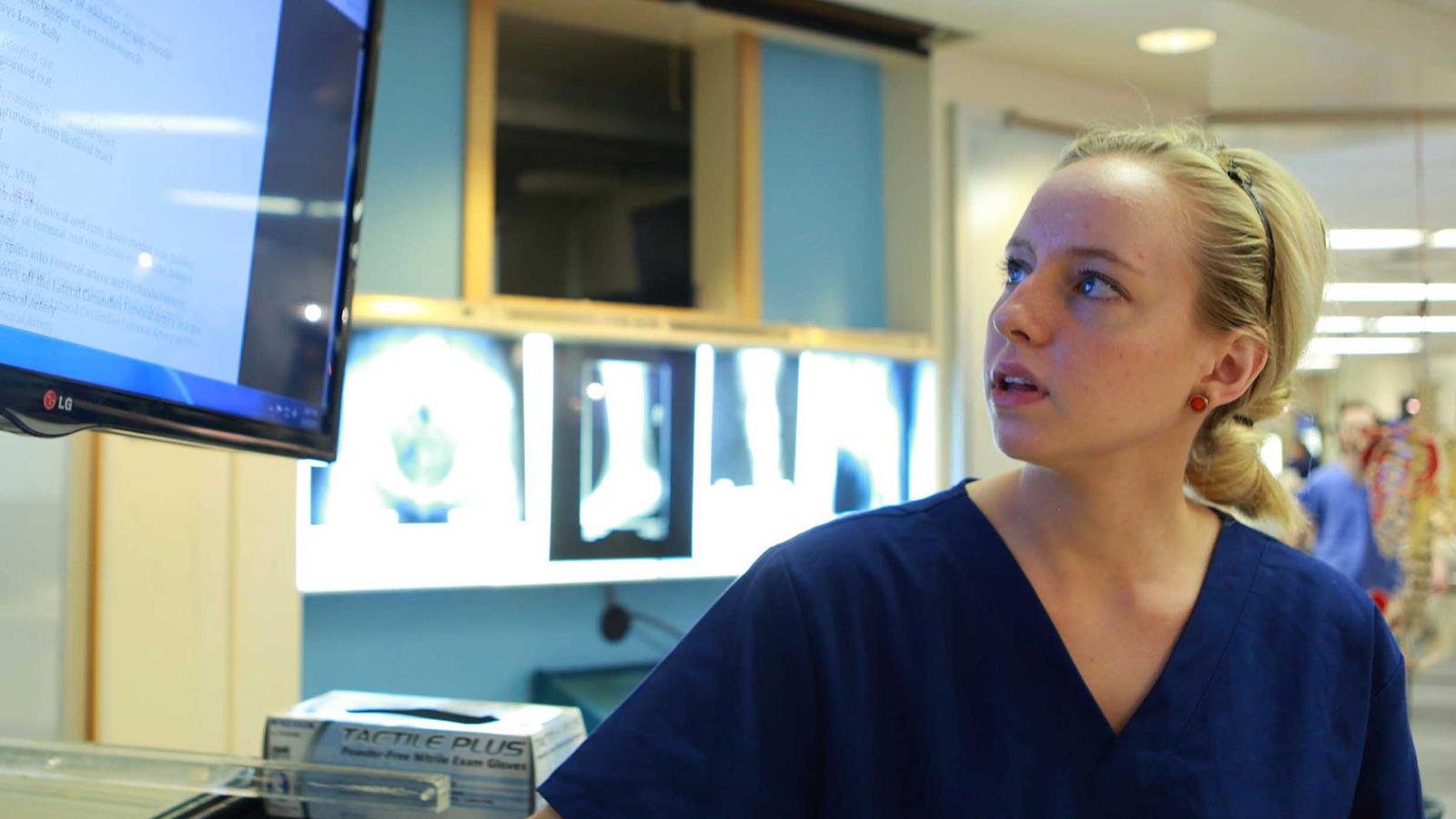 Drexel Medical student reviewing clinical data
