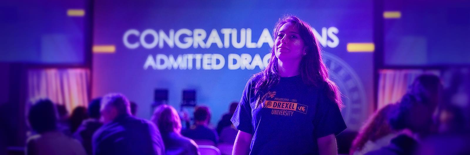 Student walking down aisle at Admitted Students Day