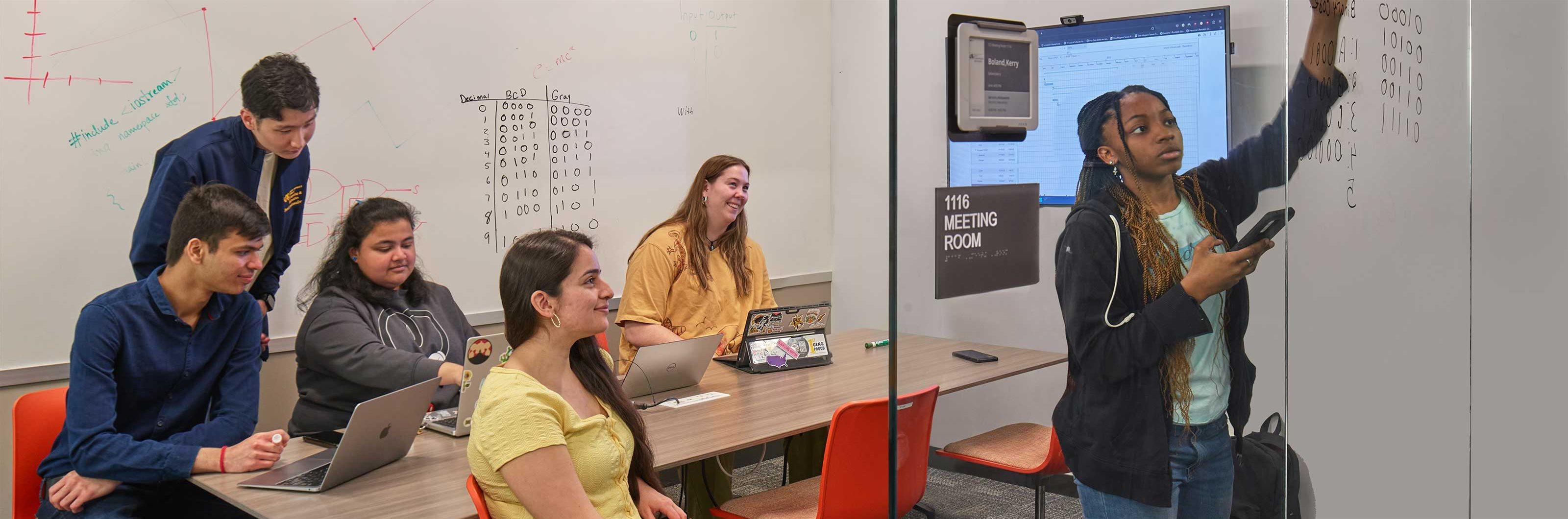 Drexel Students in a collaboration room