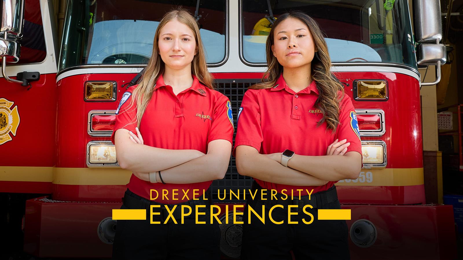 Students standing in front of a fire truck