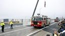 Reopening of I-95 with fire truck and U.S. flag