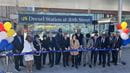 People cutting the ribbon at the Drexel Station at 30th Street.