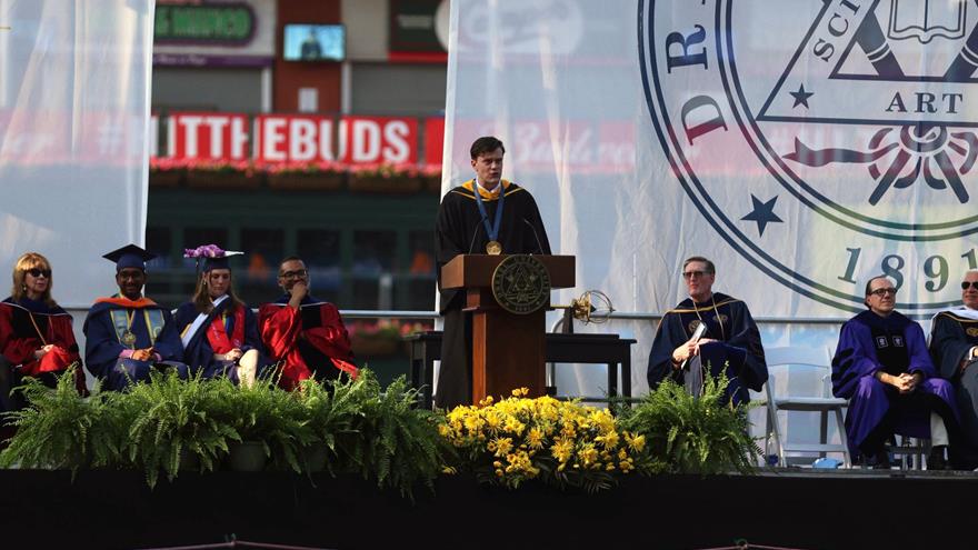Justin Best at the podium at Drexel's 2025 Commencement.