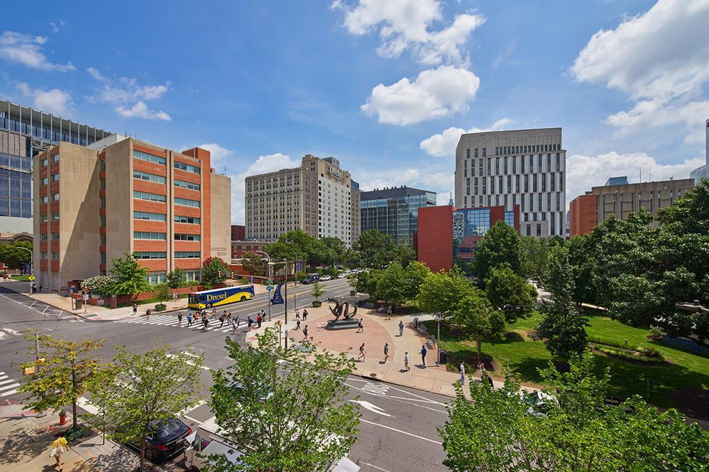 Mario the Magnificent statue and the 33rd and Market Street intersection of Drexel's campus.