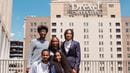 Five students in front of University Crossings