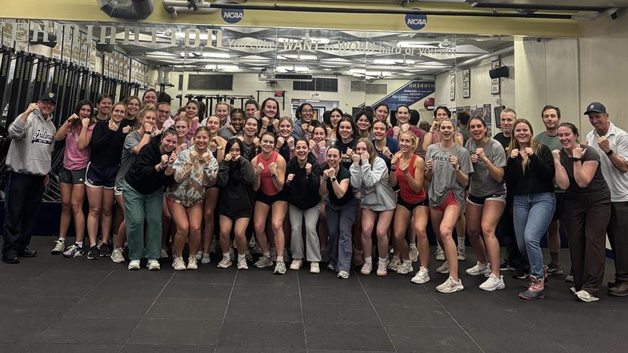 Drexel's women's rowing team lined up in rows after completing a public safety course.