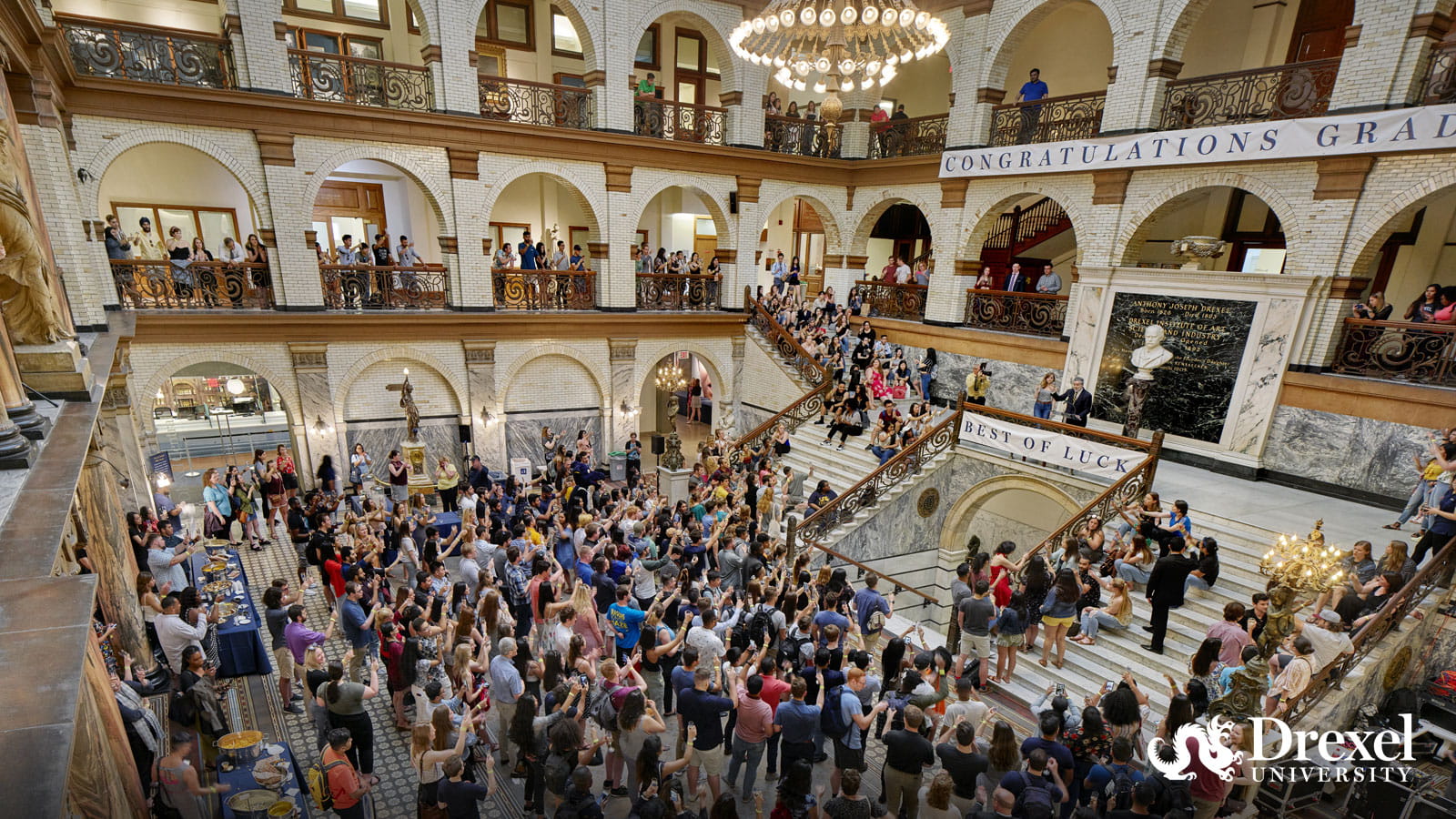 Students toasting in Great Court