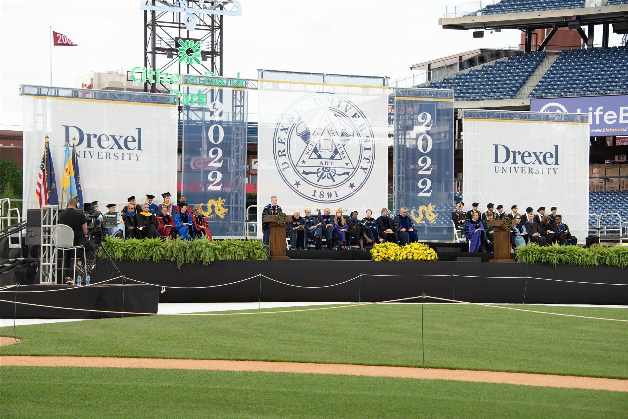 Drexel President John Fry on stage at Drexel&#39;s 2022 Commencement at Citizens Bank Park. Photo credit: Kelly &amp; Massa Photography.