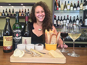 Sande Friedman with wine and cheese board
