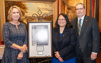 At the installation ceremony, from left to right: Christine D. Berk, Dean Santos, Thomas E. (Rick) Berk.