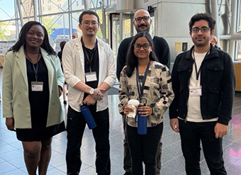 Five SCIS information science PhD students at DEGS in 2026.