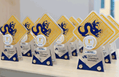 Drexel SCIS Senior Project award trophies on a table.