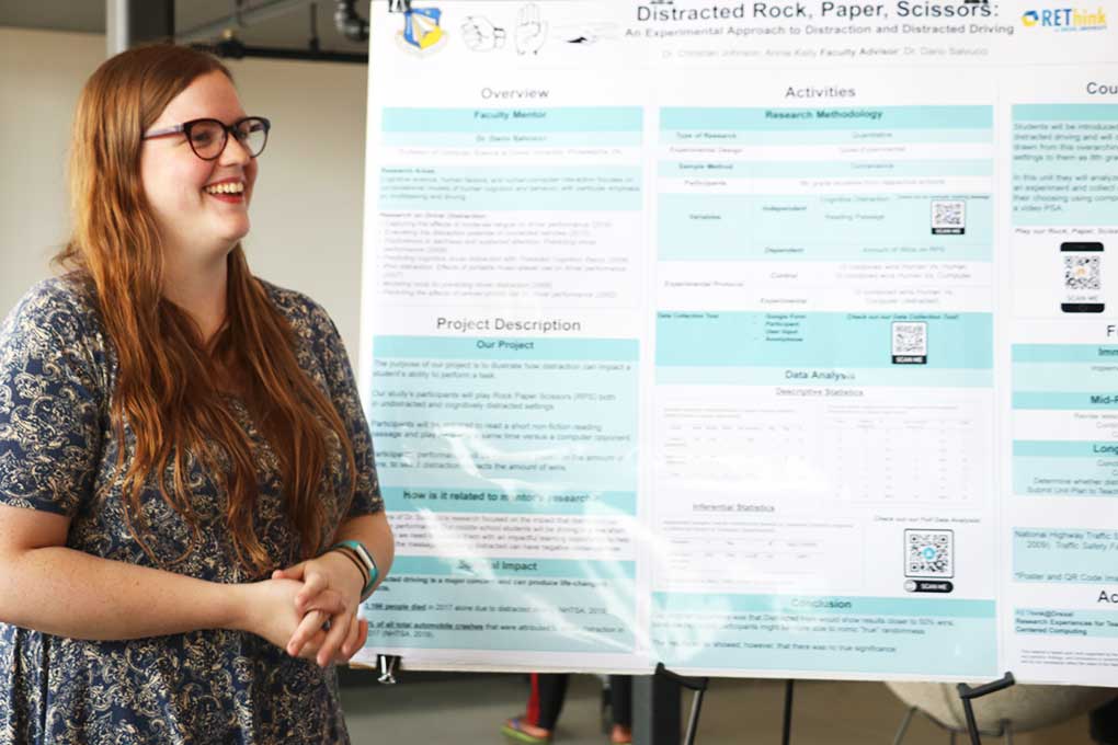 Annie Kelly presenting her work on distracted driving at the REThink Poster Showcase on August 1, 2019.
